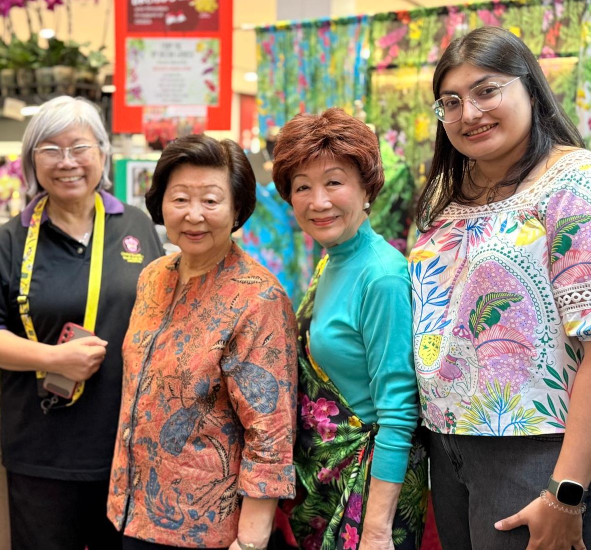 Mrs. Mary Tan visiting Shelley at The Singapore Shawl booth